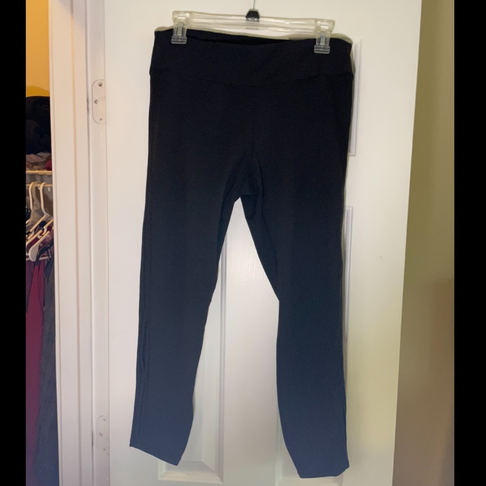 Black leggings with side slit detail on calf